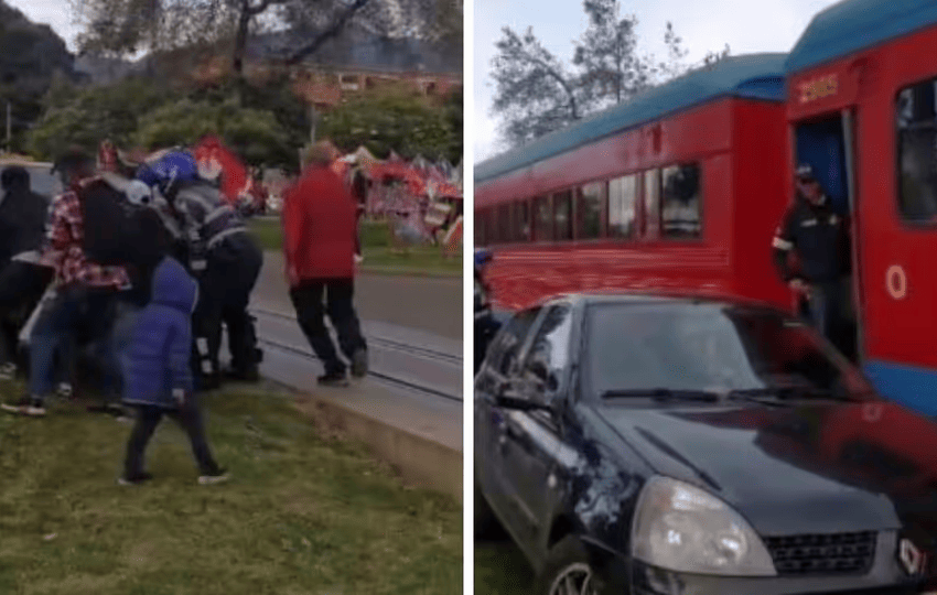  ¡Por poco se lo lleva el tren! personas alzaron un carro para sacarlo de las vías férreas de Bogotá